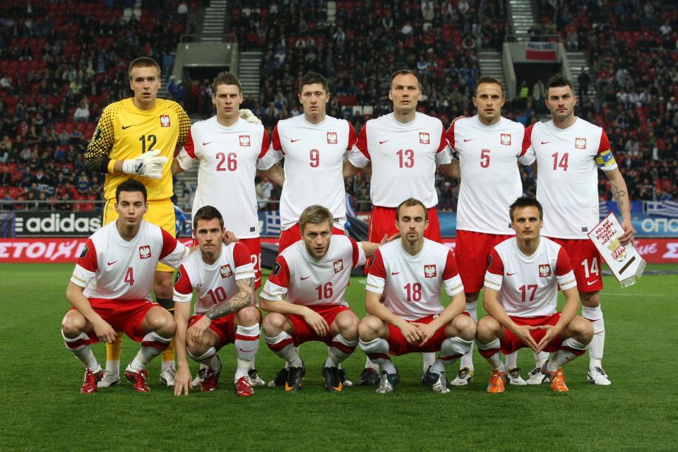 Reprezentacja Polski przed meczem z Grecją w Pireusie w 2011 roku. Pożegnanie Michała Żewłakowa.